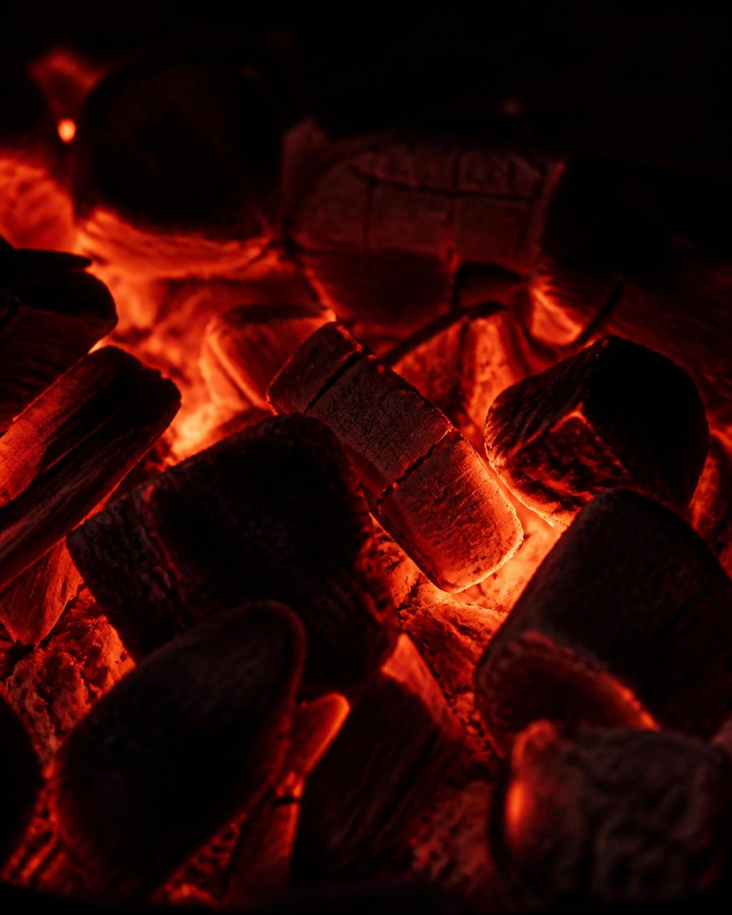 Glowing charcoal coals